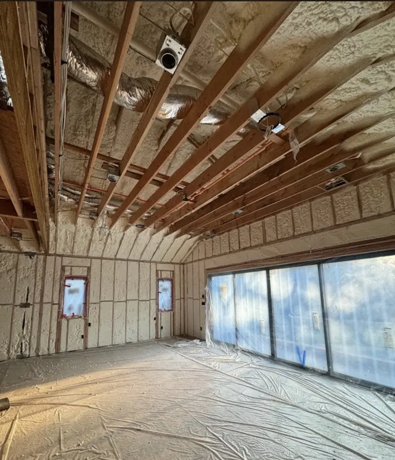 Interior walls and ceiling insulated with spray foam during new construction in Richfield